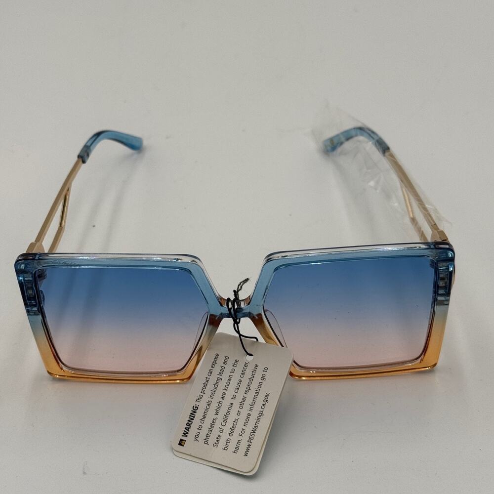 Kleo Women's Fashion Sunglasses Two-Tone Blue Amber Gradient Frame Gold Arm Lion